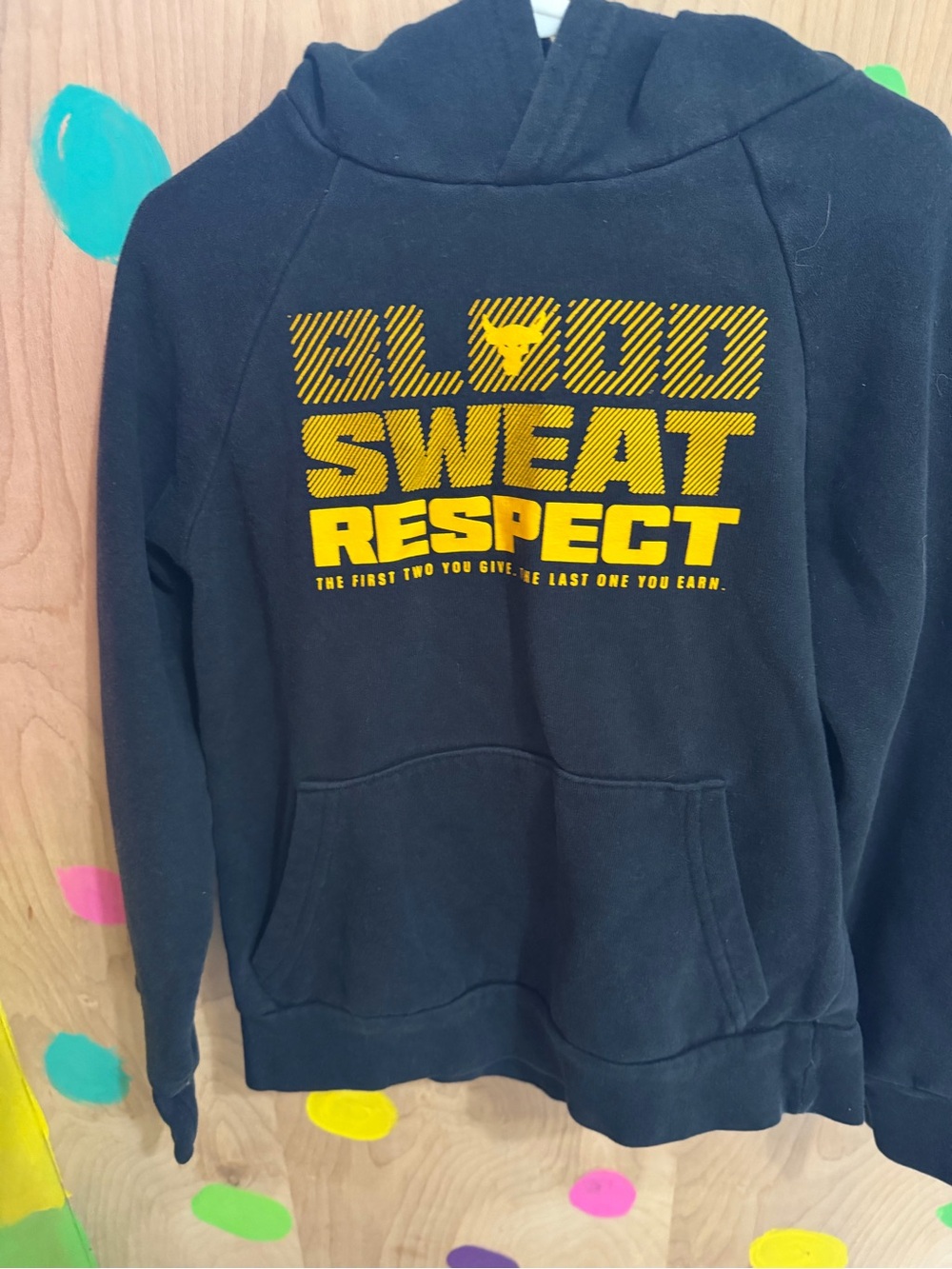 Under Armour Black Hoodie Sweatshirt with Yellow 'Blood Sweat Respect' Graphic